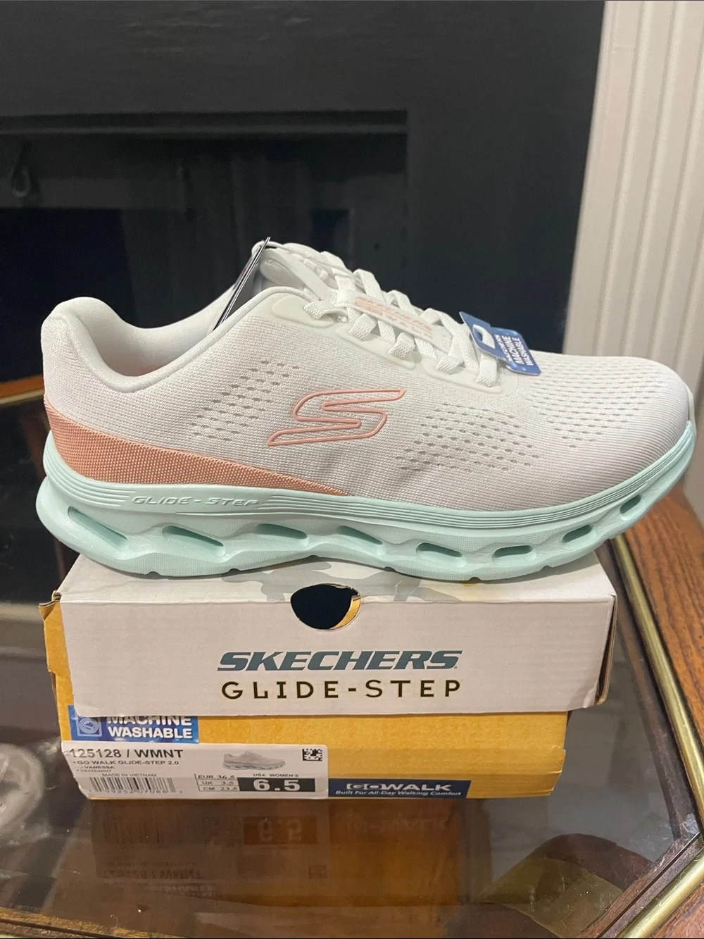 Skechers Women's White Athletic Sneakers with Mint Sole and Peach Accent